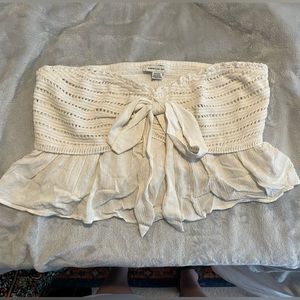 Cream strapless top with bow detail